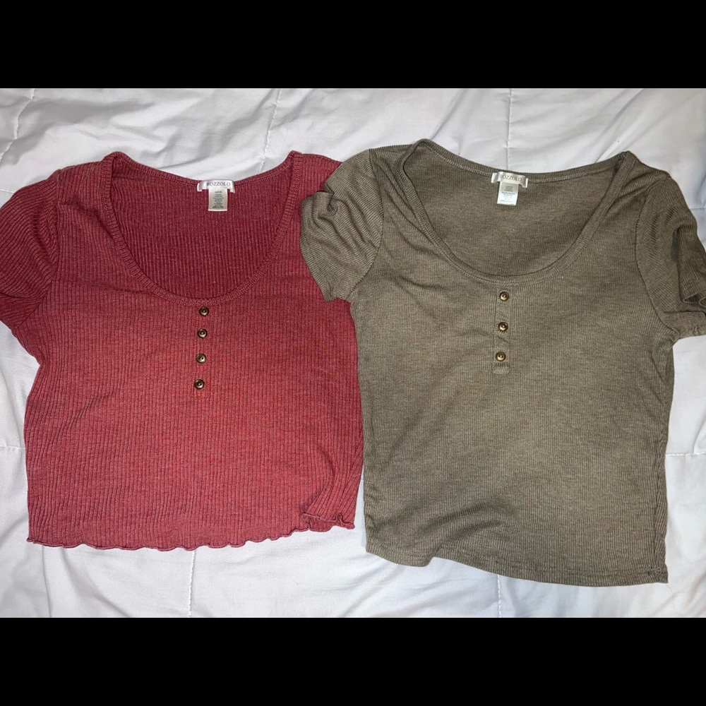 Two crop top shirts. both size large.